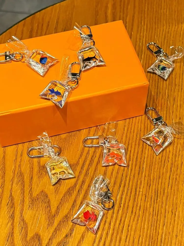 2025 nouvelle tendance corail poisson sac résine charme océan Transparent petit poisson porte-clés voiture clé décoration cadeau porte-clés en gros