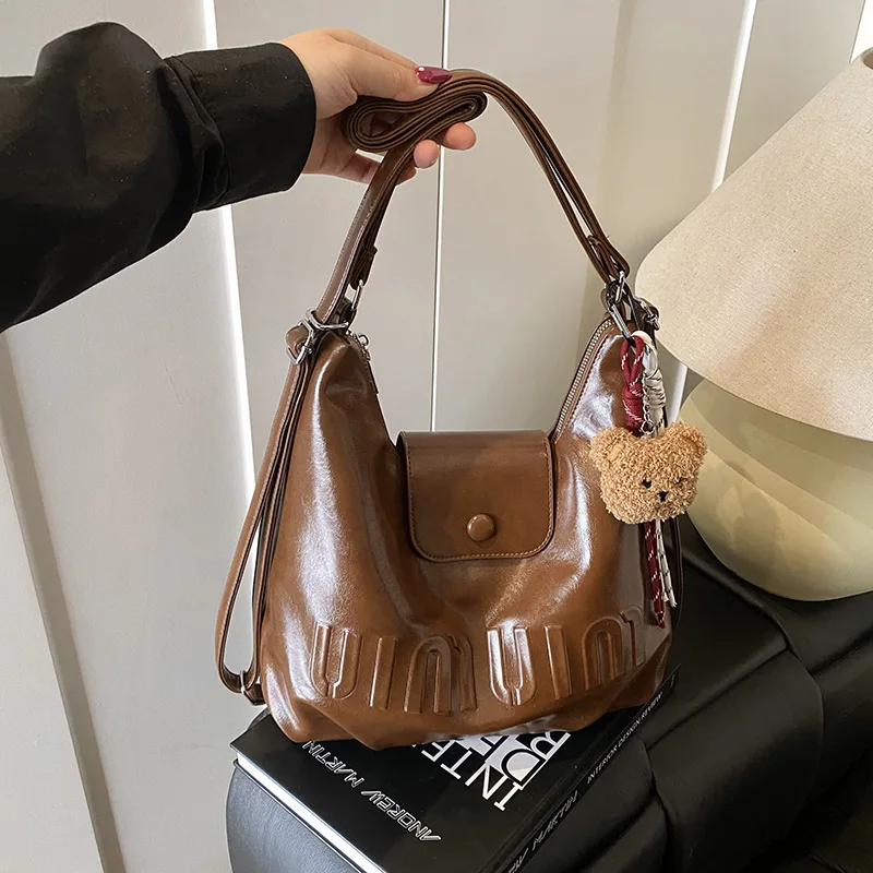 

Нишевая сумка через плечо осень-зима 202, женская сумка через плечо для пригородных поездок, модная сумка-тоут «день-ночь», роскошная сумка на ремне, минималистский стиль