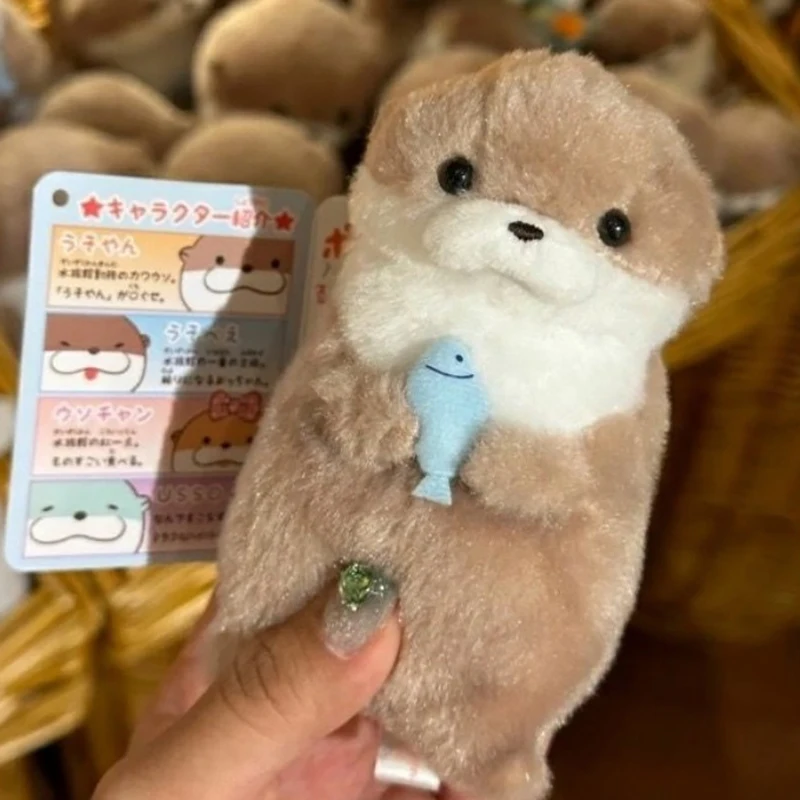 

11CM Cute Otters Holding Fish Plush Doll Keyrings Lovely Otters Plush Pendant Keychain Stylish Backpack Keyrings Pendant For Kid