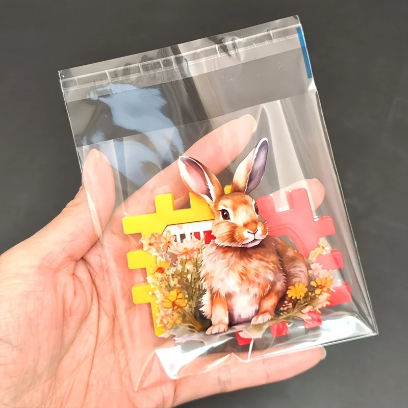 100/200 Stück Geschenktüten mit Osterhasen- und Blumenmuster, niedliches Hasen- und Frühlingsblumenmuster, transparente, selbstklebende Beutelverpackung – Detail 9