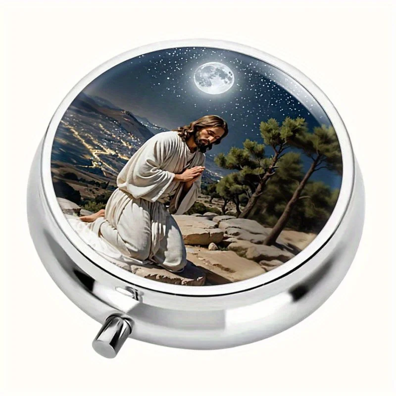 A round pill box, featuring a design of a man kneeling under the moonlight, and designed with three compartments. This metal pill box features a tranquil spiritual theme, is convenient for travel, and makes a thoughtful gift for those with faith.