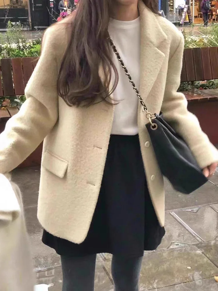 

Однотонный шерстяной пиджак на одной пуговице OUCNE: модный и элегантный осенне-зимний жакет из смесовой шерсти от китайского бренда для женщин