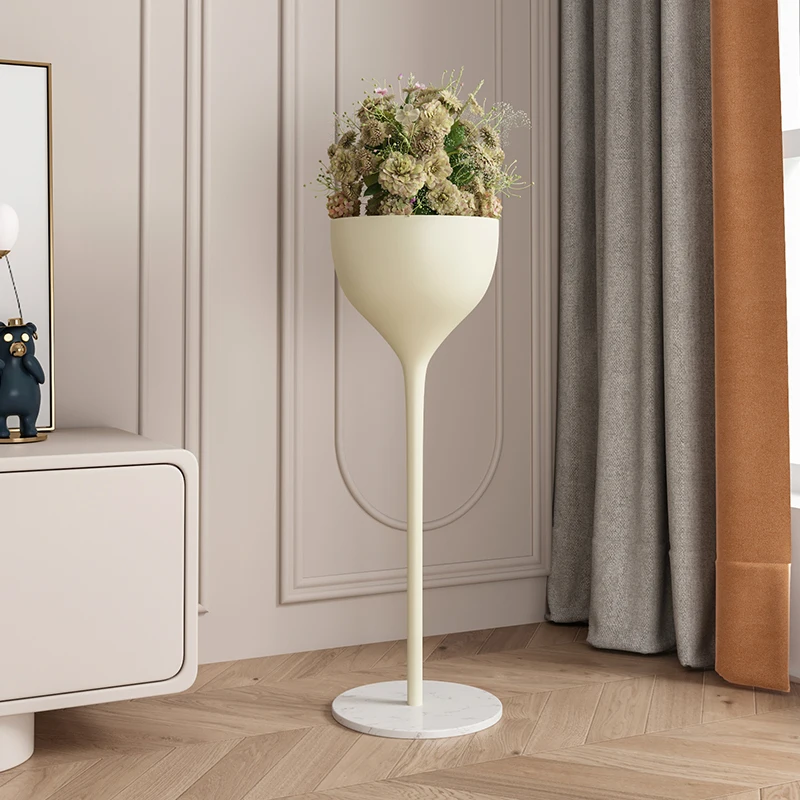 Cream wind flower shelf, floor standing minimalist living room, family balcony, sofa, placed next to flower pots, green pineappl