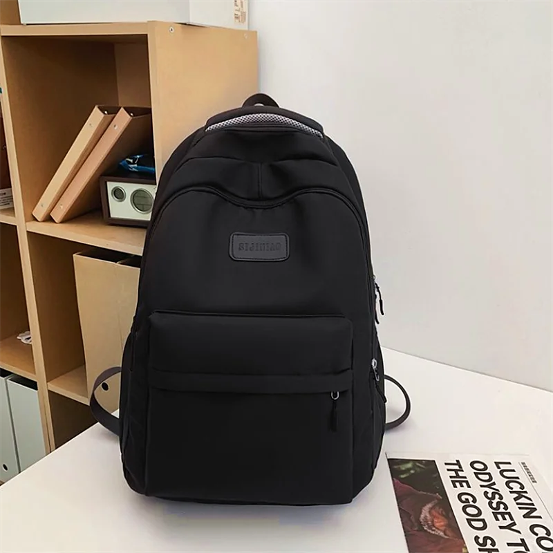 

Students' large capacity simple schoolbags and students travel backpacks versatile backpacks