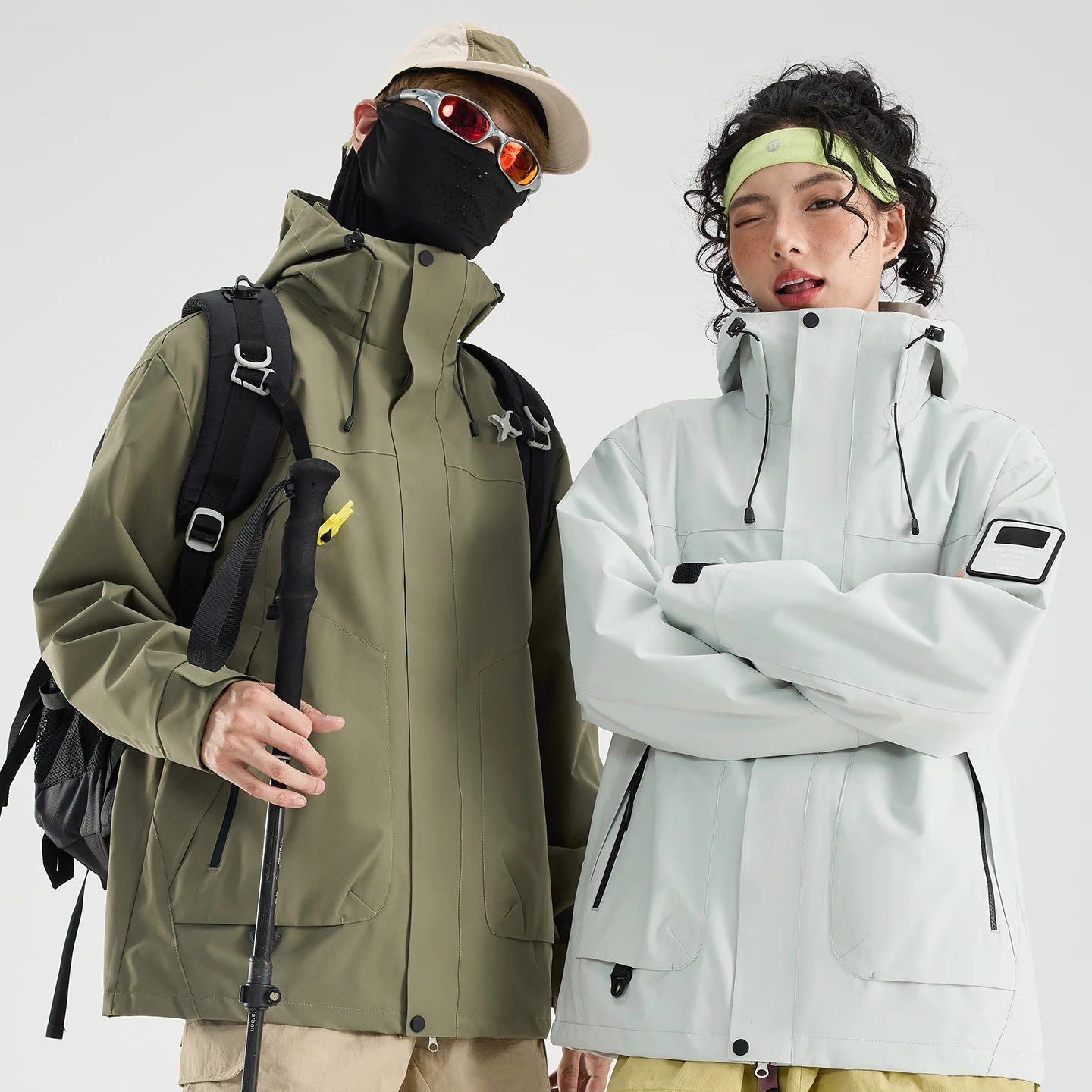 Couple Loose Hooded Windbreaker Men Women Waterproof Windproof Jacket Multi‑Pocket Arm Badge Outdoor Hiking Camping Outer Coat