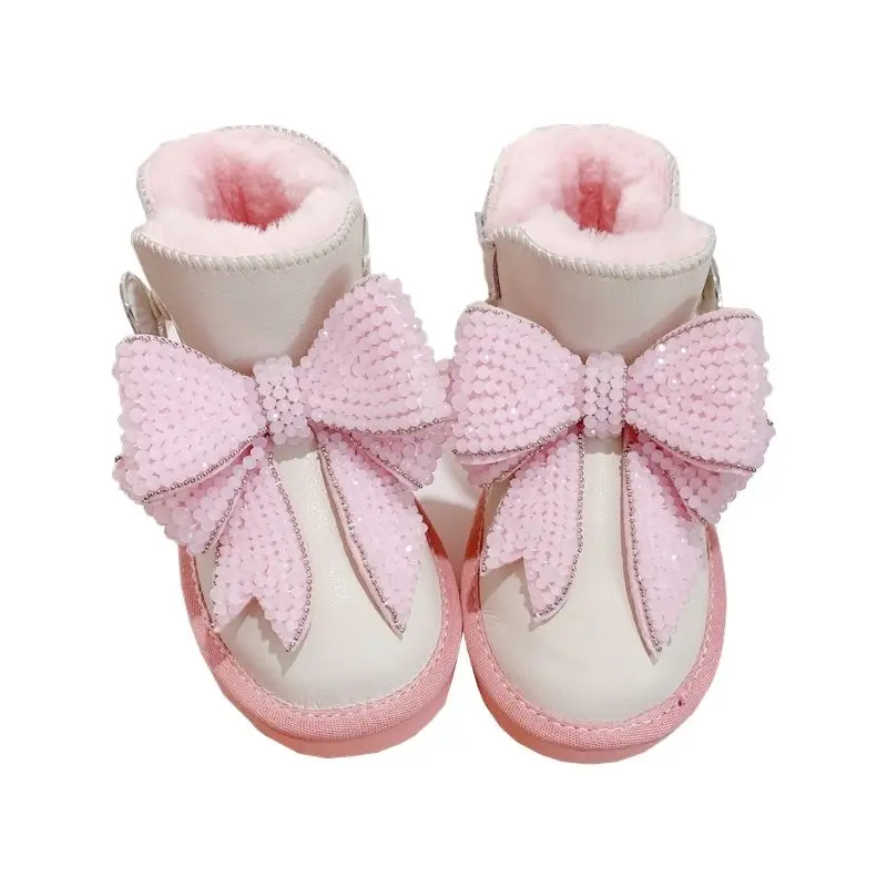 أحذية الثلوج الحرارية للفتيات لشتاء 2026 بفيونكة وردية كريستالية للكاحل غير قابلة للانزلاق من القطن الدافئ ​   الأحذية