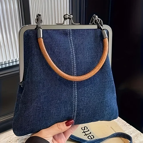 Imagen 1 del producto Bolso bandolera de mezclilla para mujer: lona azul, correa de cuero. Minimalista, Duradero. Perfecto para uso diario.