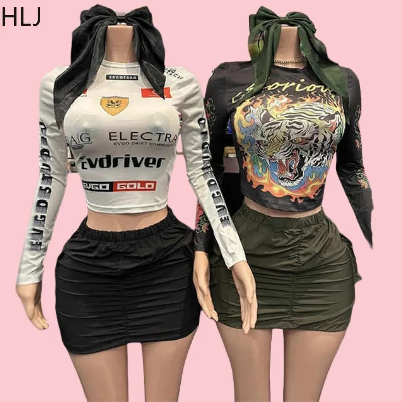 

HLJ Fashion Y2K Graphic Tshirts Two Piece Sets Women Round Neck Long Sleeve Slim Top And Drawstring Cargo Mini Skirts Outfits