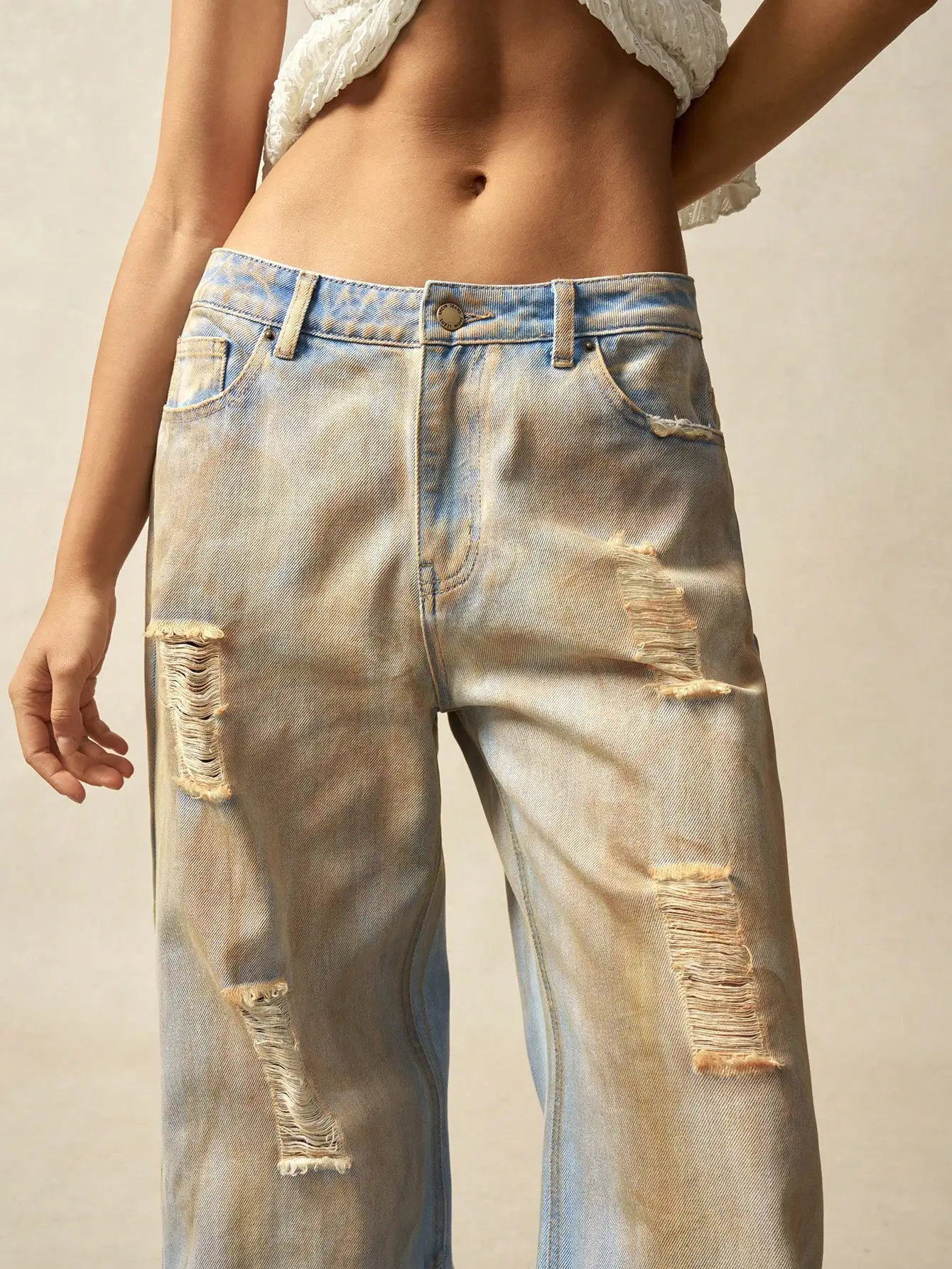 Pantaloni da donna in denim con foro sbiadito in stile streetwear di fascia alta in stile americano, nuova collezione 2025
