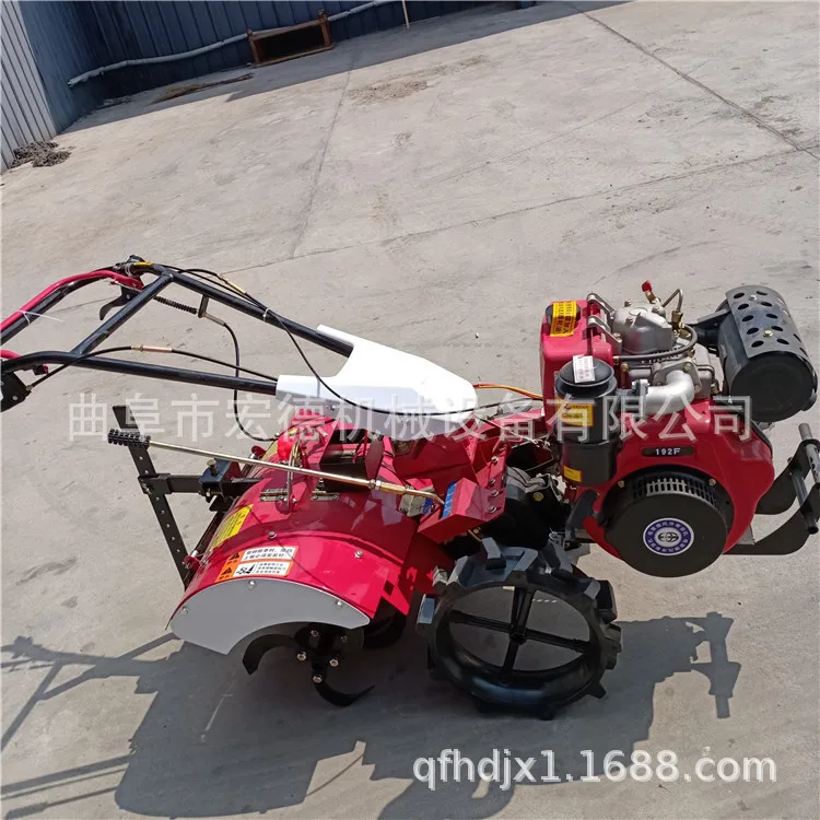 

Small direct connected four-wheel drive micro tiller Convenient scarifier Hand held gasoline micro rotary tiller