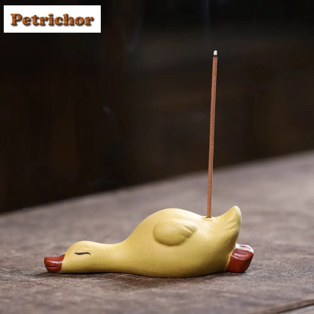 

Yixing Purple Clay Lying Flat Little Yellow Duck Incense Stick Tea Pet Handmade Tea Spirit Tea Figurine Play Toys Tea Statue