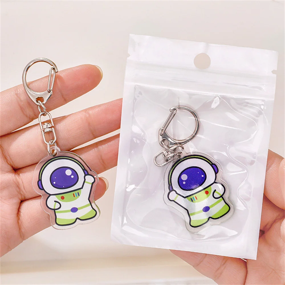 Cartoon Astronaut Acrylic Keychain Colourful Moving Liquid Quicksand Drift Bottle Keyring for Women Couple Bag Charm Key Chains