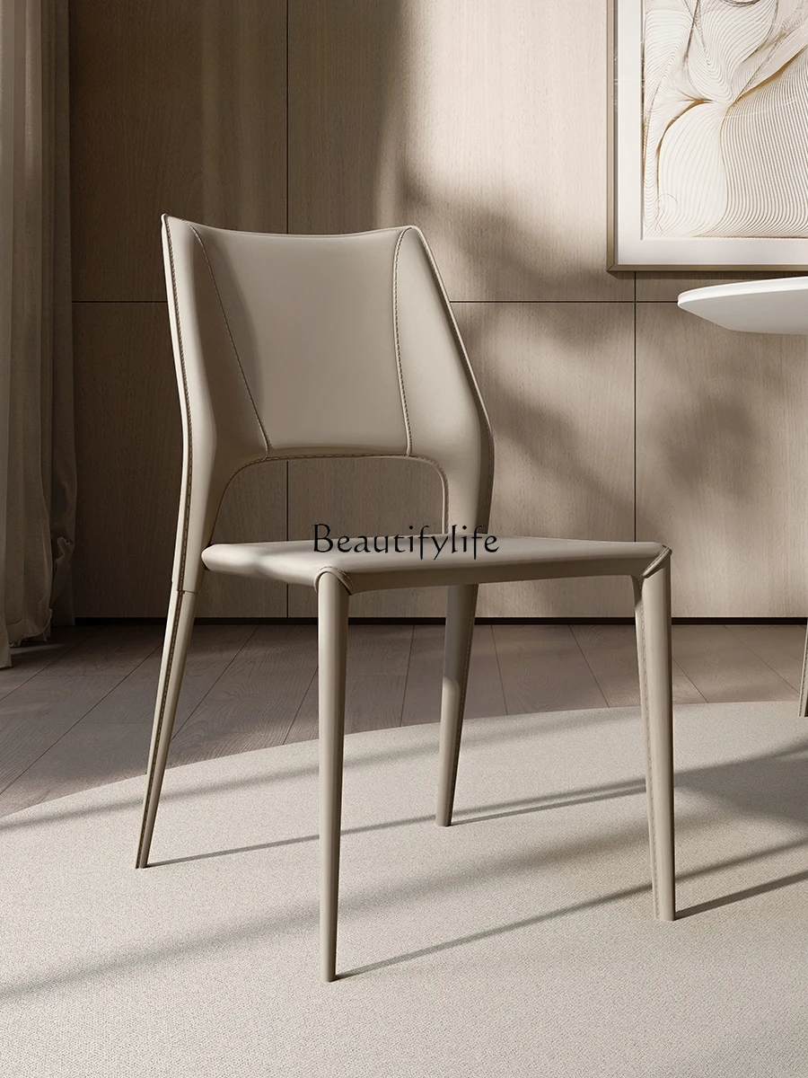 

Italian minimalist saddle leather dining chair high-end fully wrapped leather ergonomic hotel chair