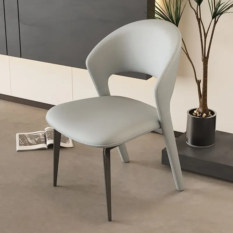 Versatile dining chairs with ergonomic design and large perforated backrest  chairs dining room  كرسي وردي  ダイニングチェア