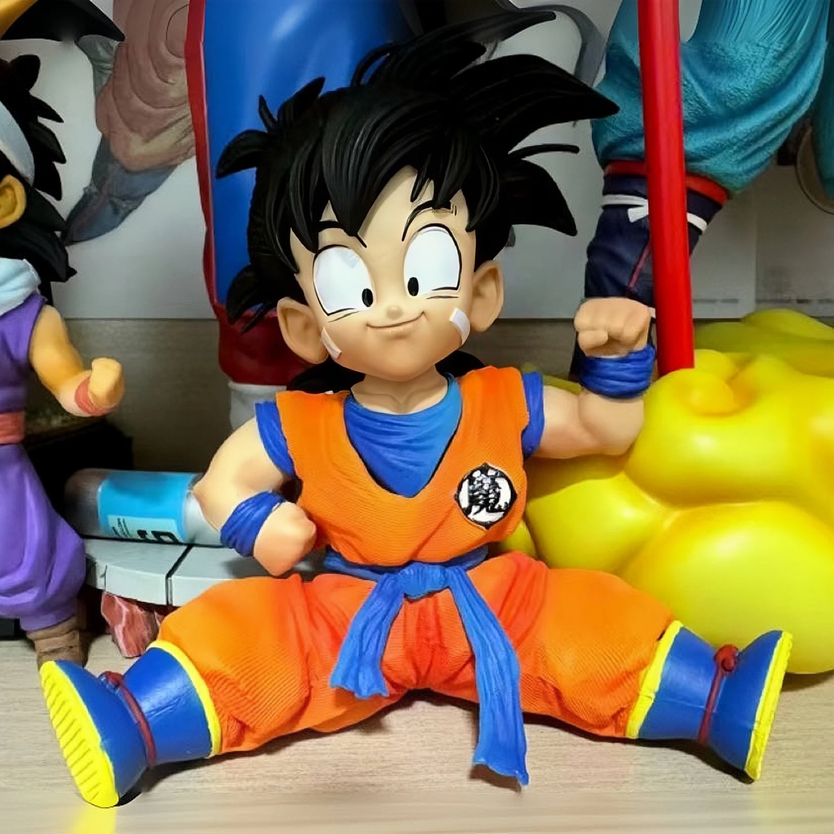 

Anime Dragon Ball Son Goku Childhood Cute Sitting Statue Action Figure Kakarotto Model Collection Figurine Children's Toy Gifts