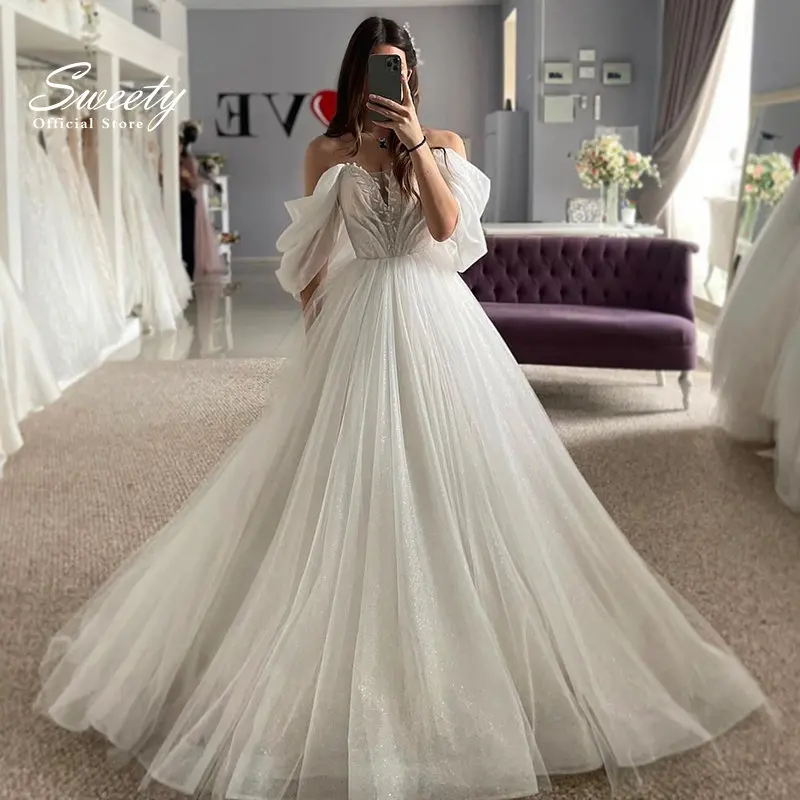 

Luxury Wedding Dress Embroidered Lace On Net With Ball Gown Train Elegant Boat Neck Full Sleeve bridal Gowns Button Robes De Ma