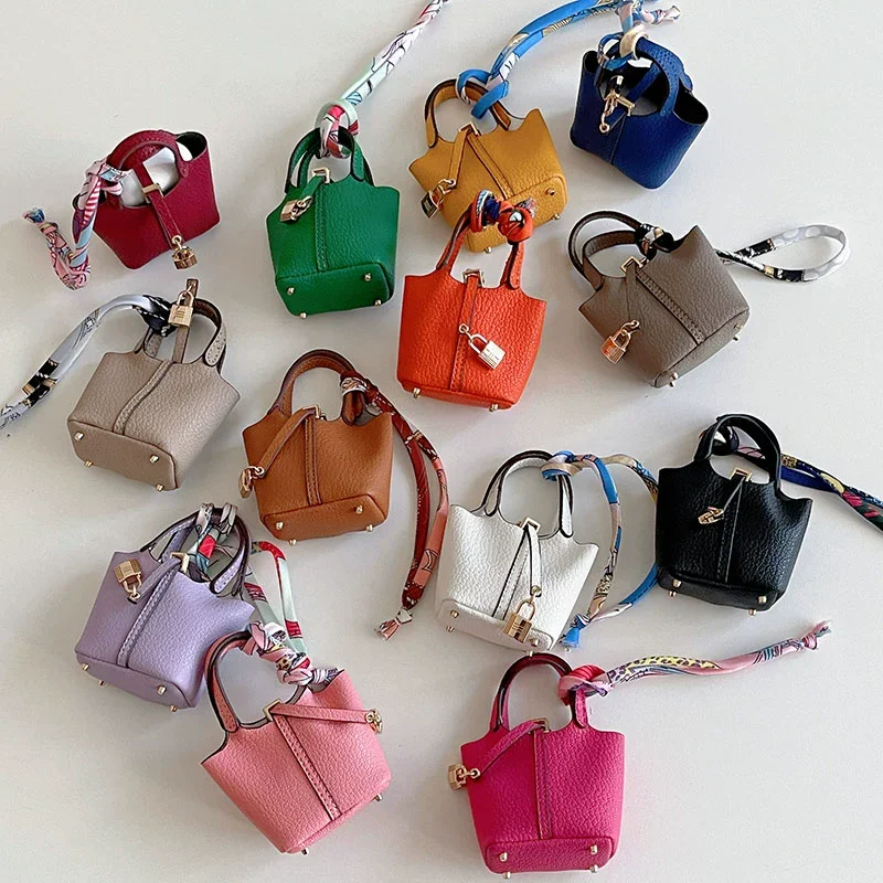 Mini borsa pendente per interni auto decorazione specchietto retrovisore borsa per cuffie in pelle di fascia alta portamonete portachiavi multifunzionale