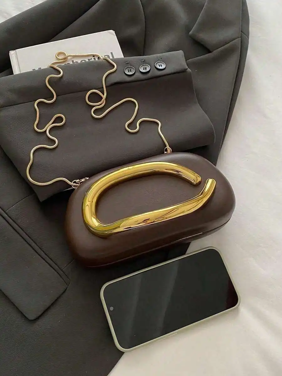 Modern Brown Leather Clutch With Gold D-Shaped Handle And Snake Chain Strap For Evening, Party, Or Daily Wear