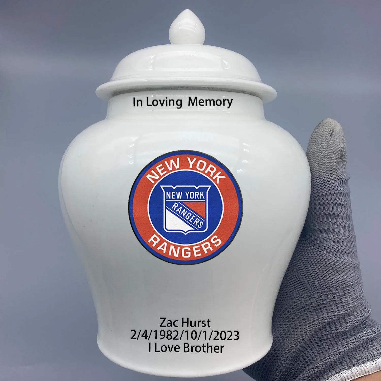 

Medium Urn for New York Rangers-themed Hockey Urn.Please send me the customize information-name/date