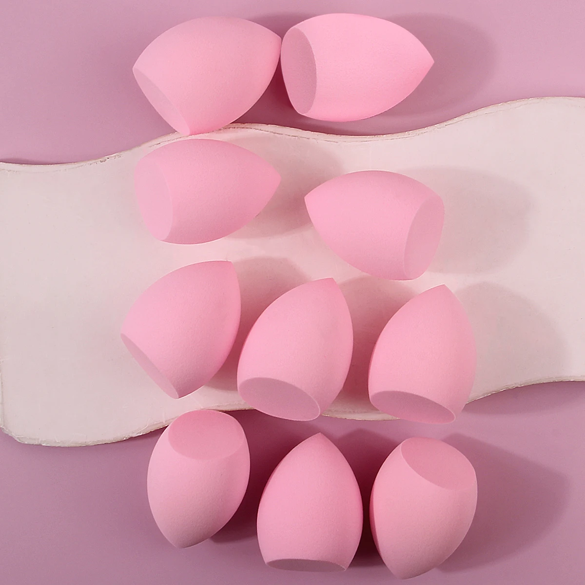 Esponja de corte diagonal rosa super macia, ovo de beleza, uma ferramenta de maquiagem facial que inchaço na água sem colar em pó com 10 peças