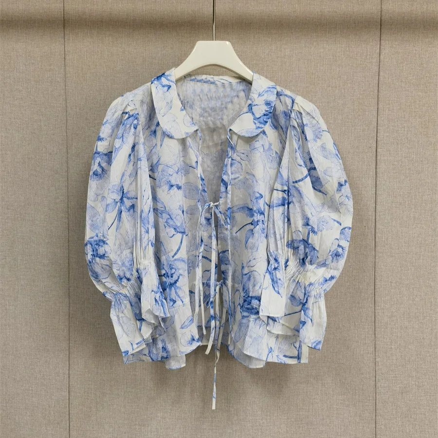 

Elegant Blue Floral Tie Doll Collar Top And Half Skirt Set Spring Summer 2025 Fashion Style Long Sleeve Women's Suit