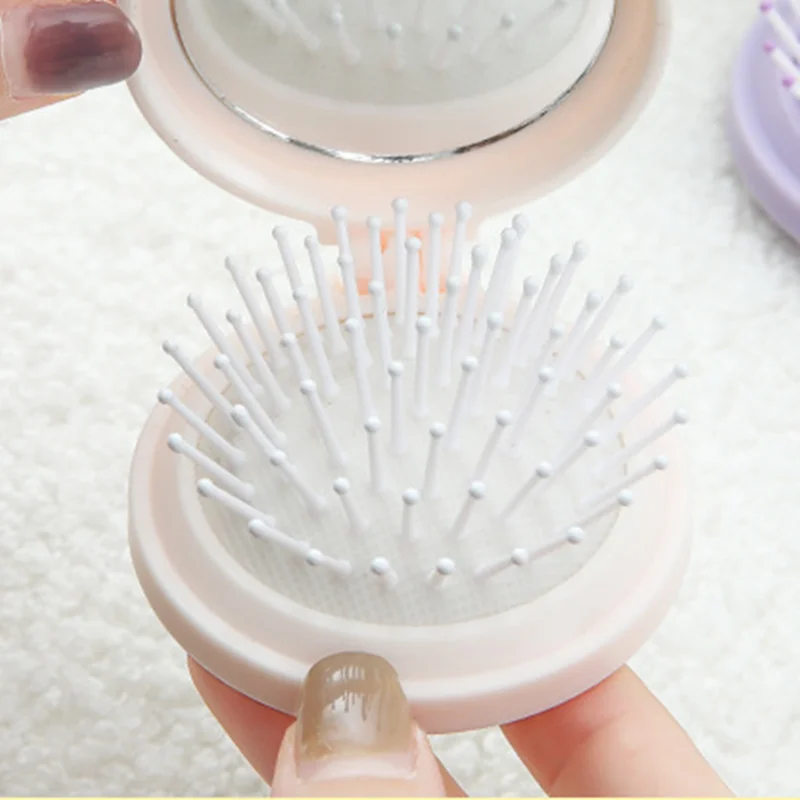 مرآة ماكياج المحمولة وسادة هوائية تصفيف الشعر مشط تدليك الرأس 1 قطعة الإبداعية الكرتون فتاة للطي وسادة هوائية مشط الشعر للطي