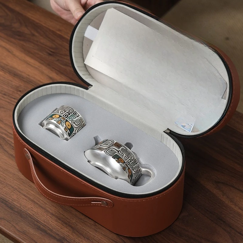 

A pot of ceramic gold and silver intricate office gifts to take with you for travel