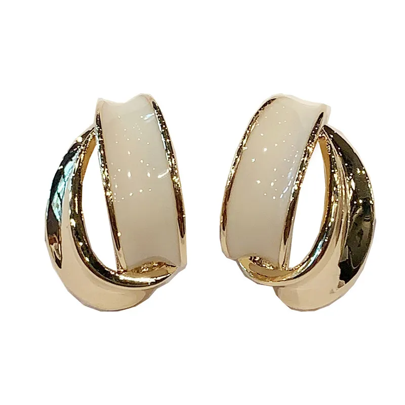 

Niche design stud earrings white curved texture temperament S925 silver needle anti-allergic earrings