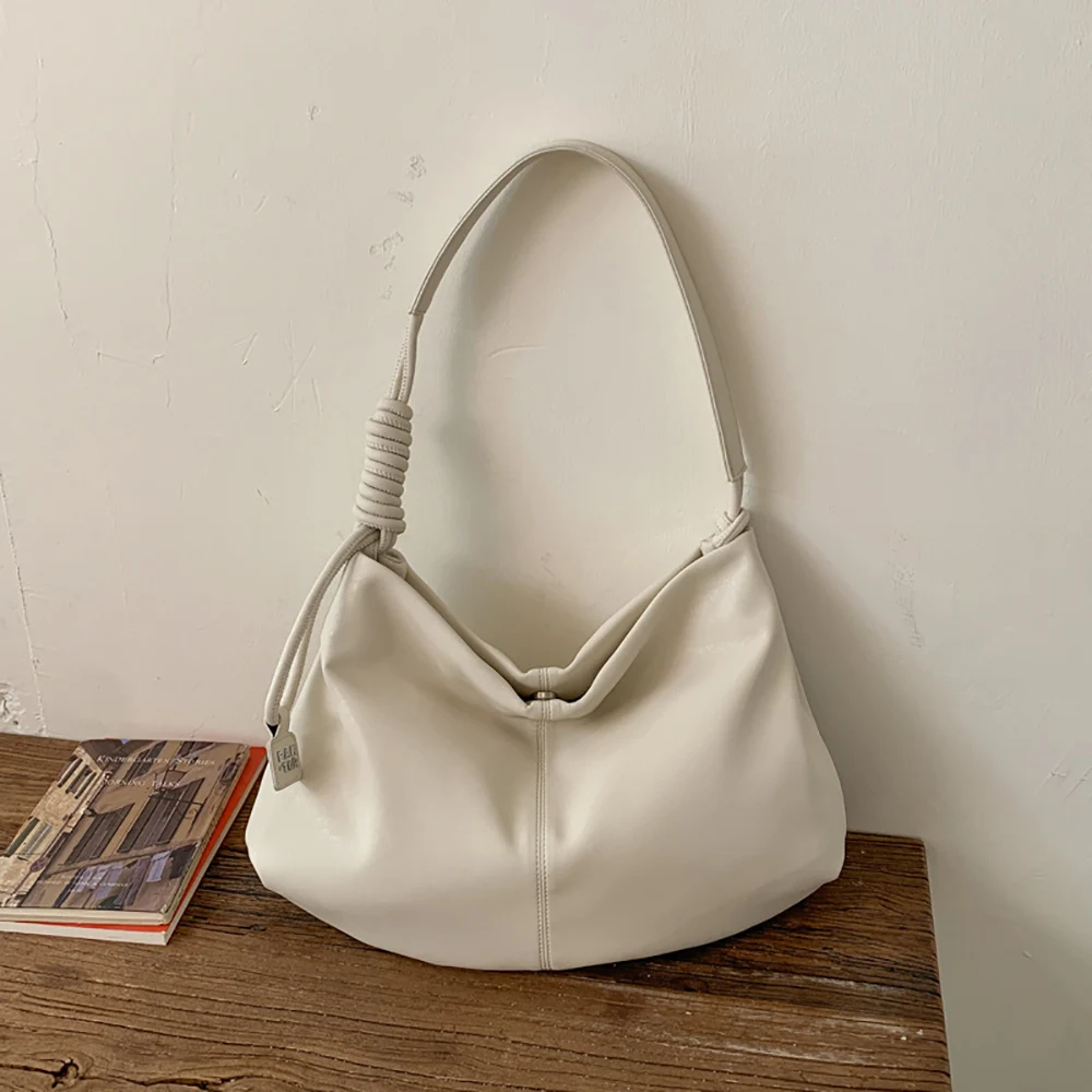 

Light Luxury Pu Texture One Shoulder Bag for Women 2026 Spring Soft Buckle Armpit Bags Daily All-Match Commute Handbags