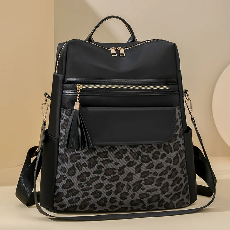 Oxford wear-resistant student laptop bag collision color waterproof large capacity diagonal cross bag travel backpack