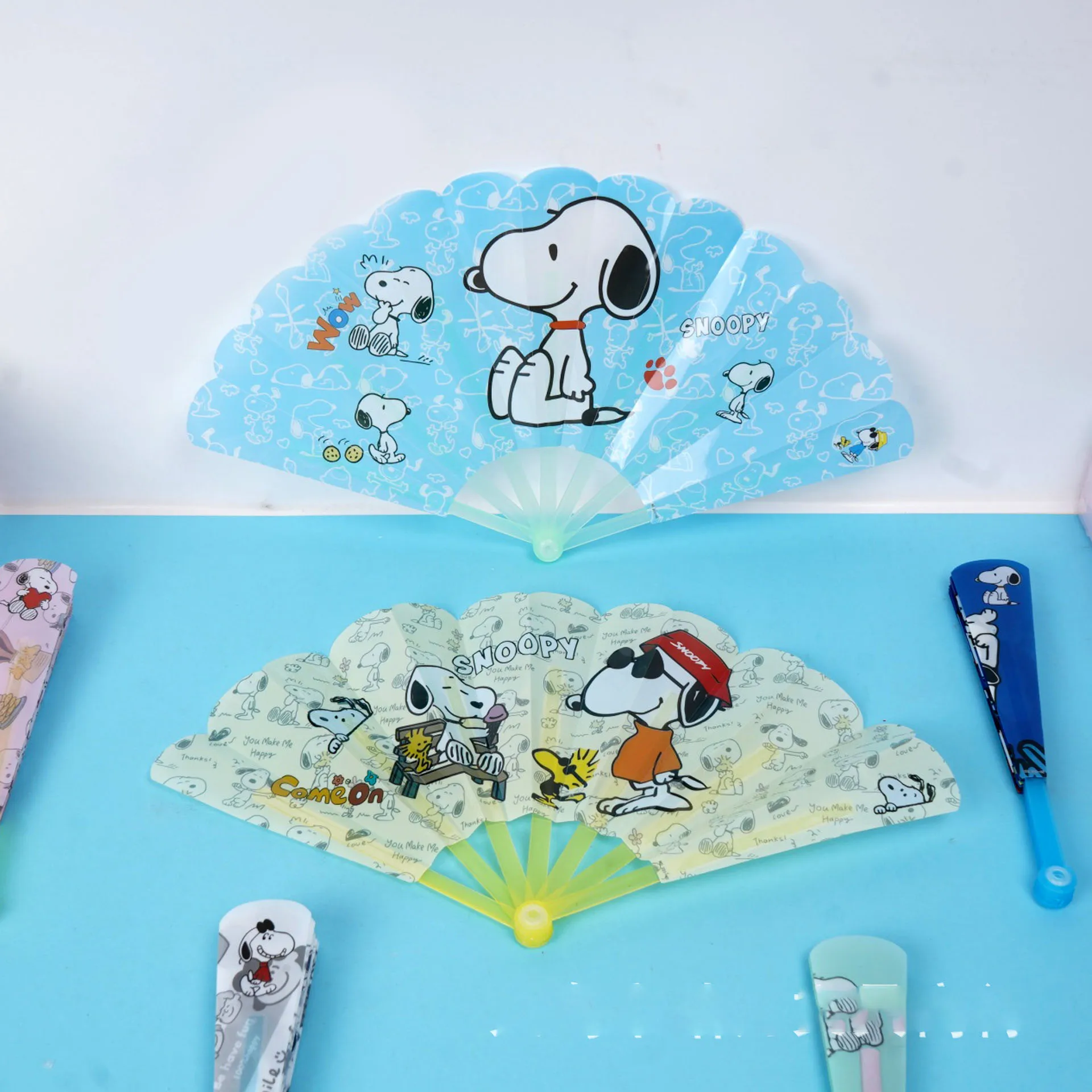 

Snoopy Mini Folding Fan Student Summer Cool Hand cranked Fan Cute High Beauty Seven Fold Fan