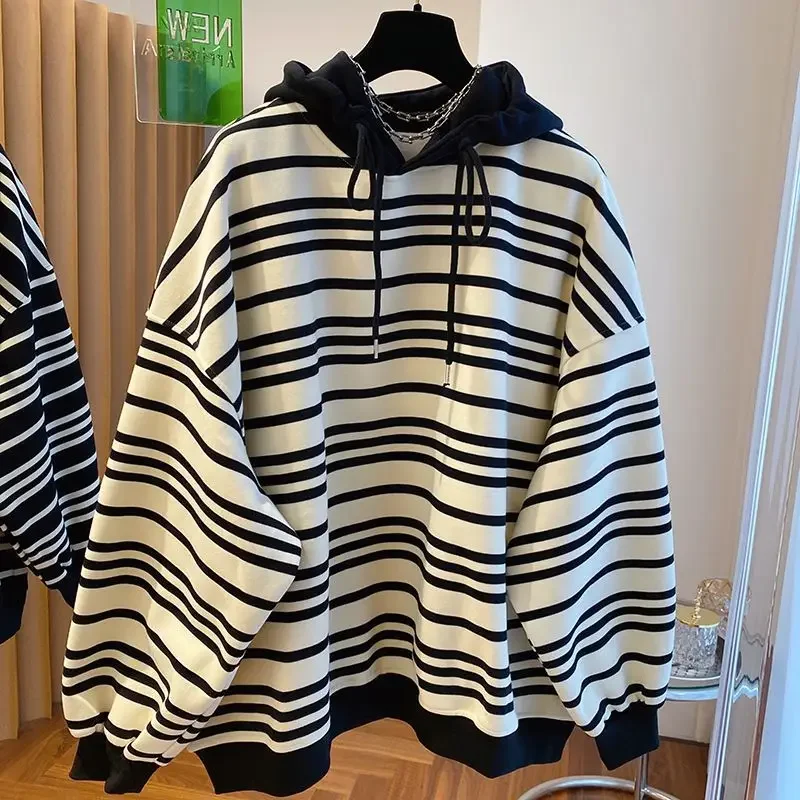 Plus size design striped sweater women's autumn and winter velvet Korean version of loose cotton tops fashion casual coat.