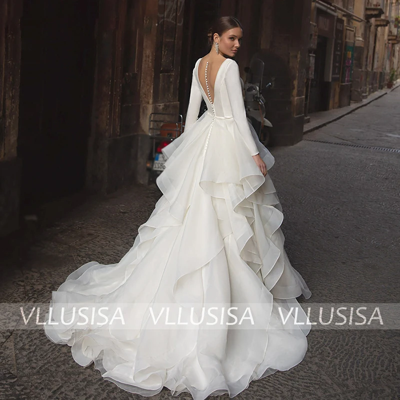 Vllusisa Ruffled Tulle Baljurk Trouwjurk V-hals Met Lange Mouwen Satin Prinses Bruidsjurk