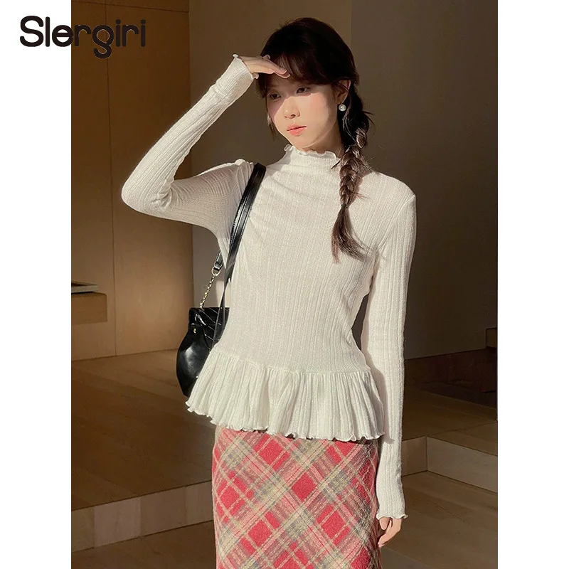 

Винтажный трикотажный топ Slergiri с воротником-стойкой, женская модная новинка 2026 года, весенняя приталенная блузка с длинным рукавом и оборками по низу