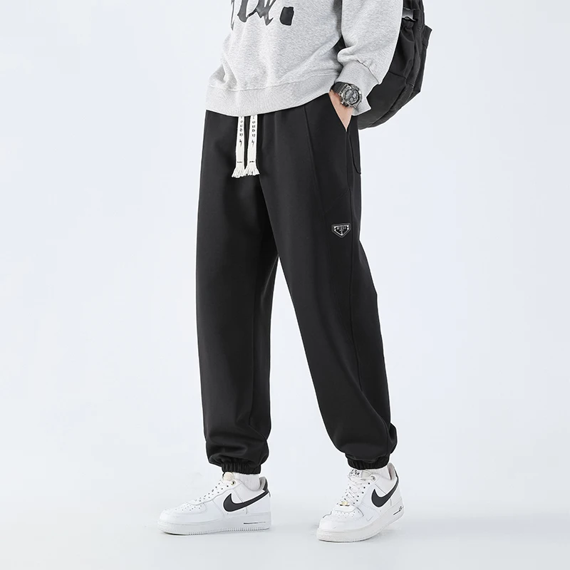 Pantaloni da uomo taglie forti L-10XL Vita elastica Vestibilità ampia Sport Gambe lunghe Moda casual Primavera Autunno Cotone Abbigliamento maschile 175KG