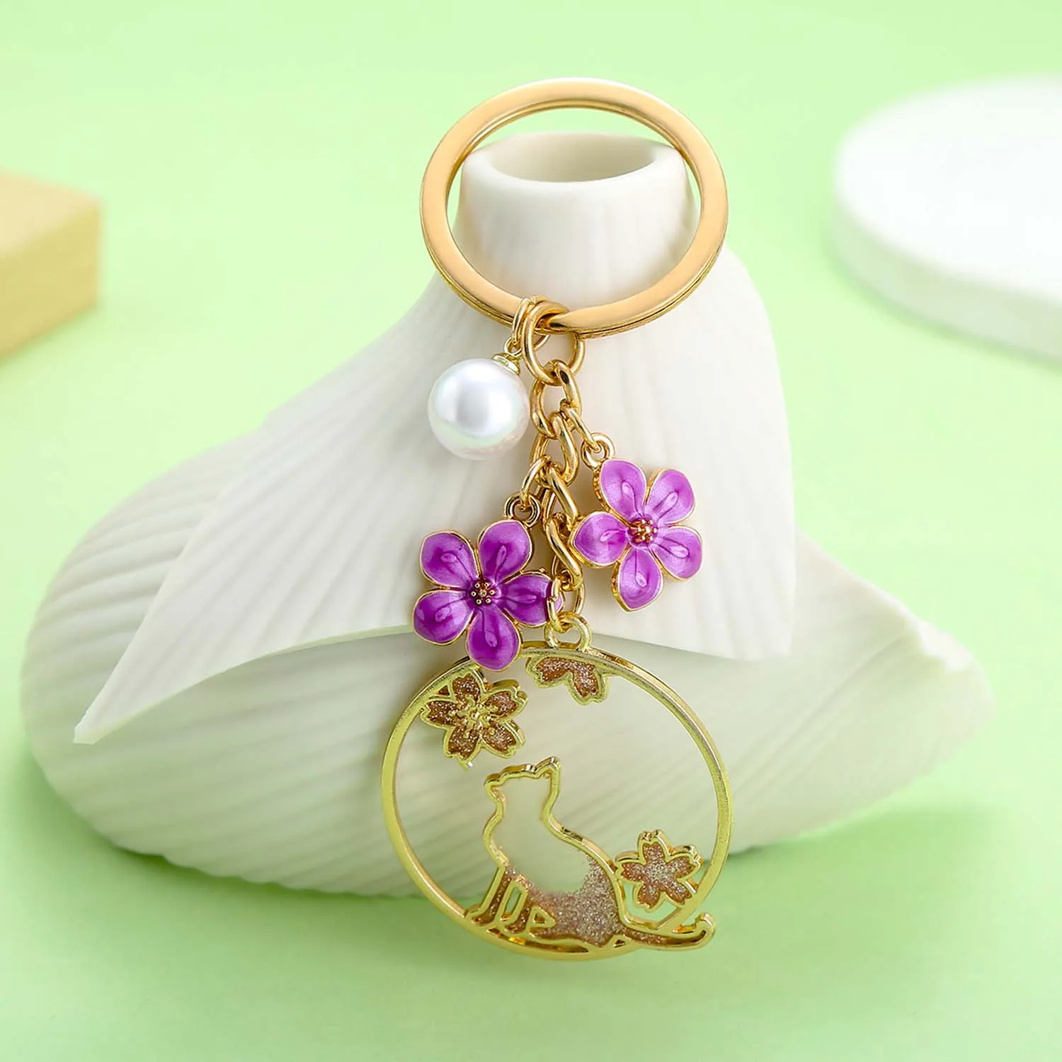 سلسلة مفاتيح زهرة زهر الكرز والقط اللطيفة من المينا ، حلقة مفاتيح من اللؤلؤ الصناعي ، مفاتيح سيارة ، حقائب ظهر ، محافظ ، 1
