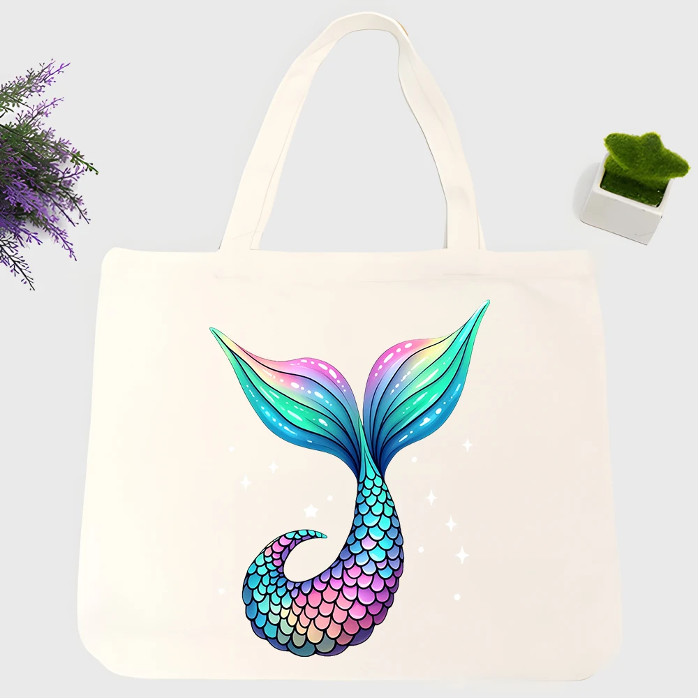 mermaid tail canvas tote bag with fantasy creature print, ideal for casual summer outings and daily shopping