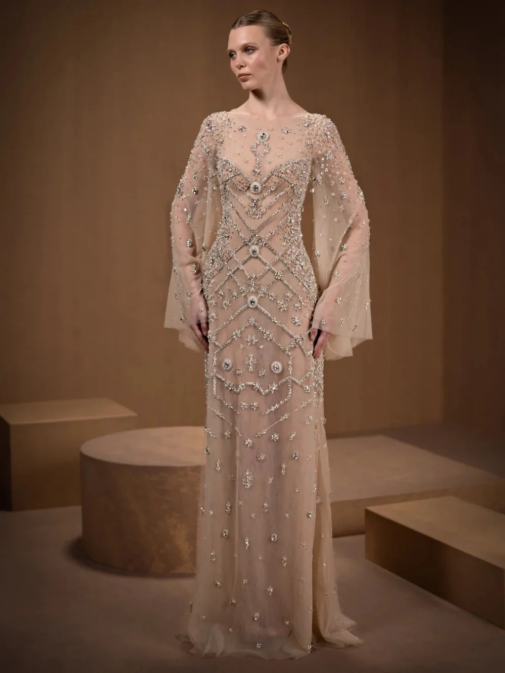 

Elegant Nude Sheer Mesh Evening Gown All Over Crystal Beading Bell Sleeves Floor Length Party Dress Wedding Guests فساتين سهرة