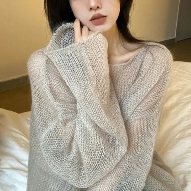 

2024 Spring New Temperament Solid Color Hollow Knitwear Women's Round Neck Fashion Long Sleeve Loose Sunscreen Clothing Tops