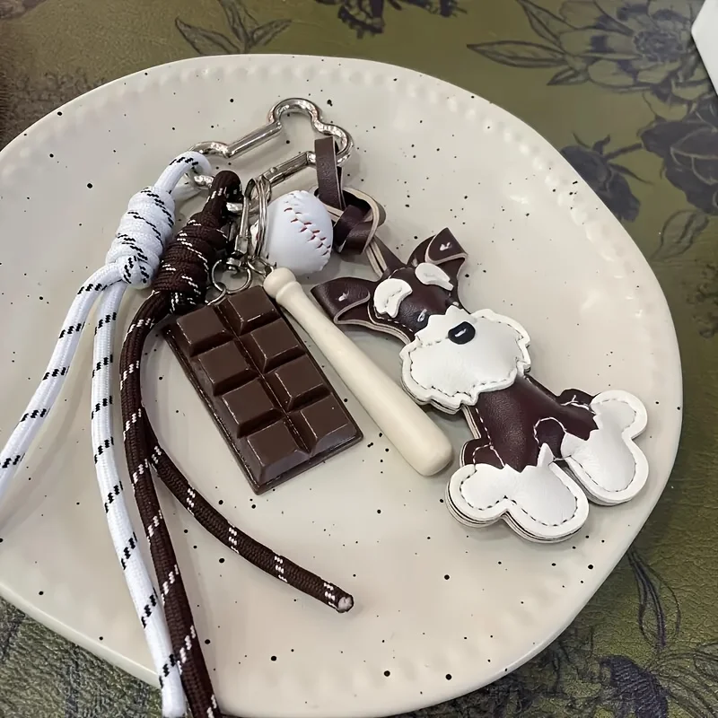 Llavero de cuero con diseño de perro Schnauzer y muñeco de nieve, color chocolate, para llaves de coche, bolso o como colgante creativo.