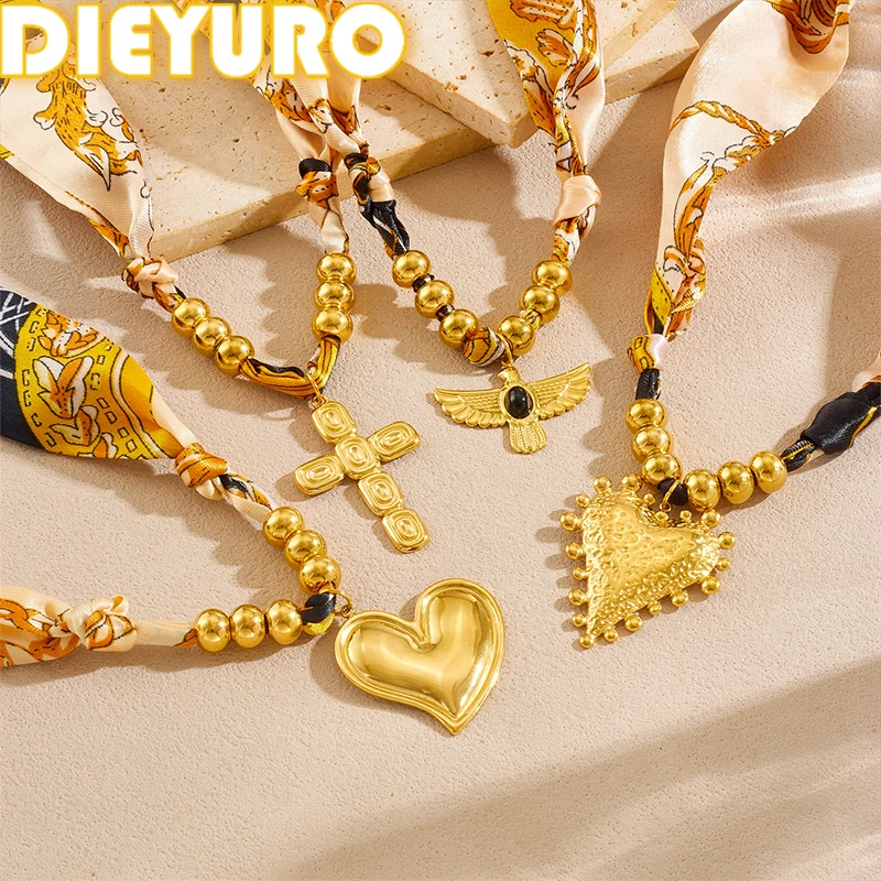 

DIEYURO 316L Stainless Steel Golden Heart Cross Eagle Yellow Pattern Ribbon Necklace Lady Fashion Waterproof Neck Chain Jewelry