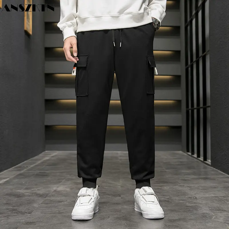 

ANSZKTN New fashion fashion loose casual pants men's plus size thick white eiderdown pants