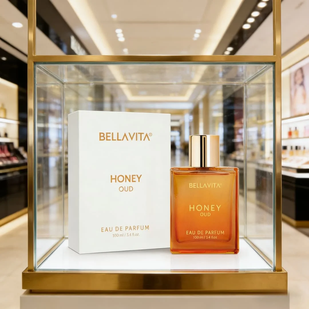 Bella Vita Luxury Honey Oud EDP | Botella cuadrada color ámbar, notas dulces de miel y oud, ambiente premium para caballeros.