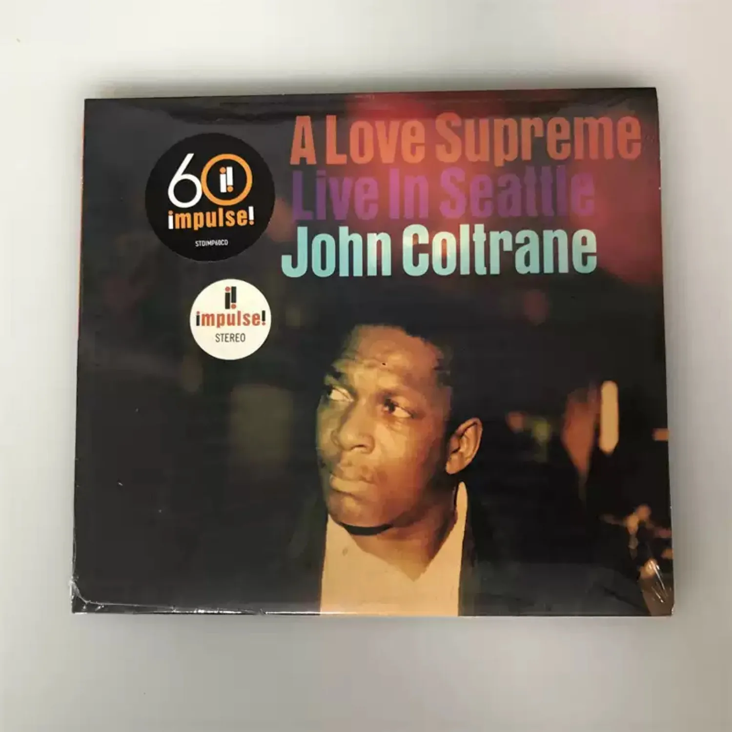 

Live Jazz Recording CD Dark Background Vintage Warm Tone Portrait Photo Cover Premium Collectible Anniversary Jazz Disc