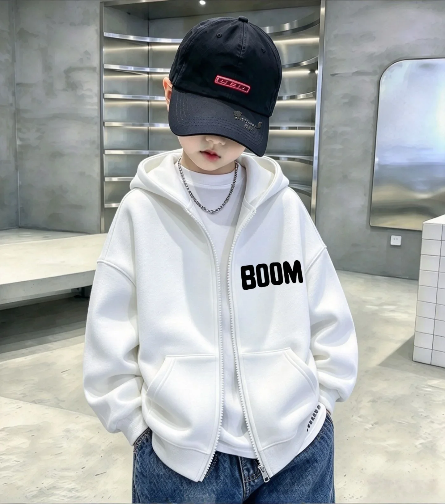 Children's hooded zip-up jacket featuring a minimalist "BOOM" graphic; suitable for both boys and girls in winter. 5