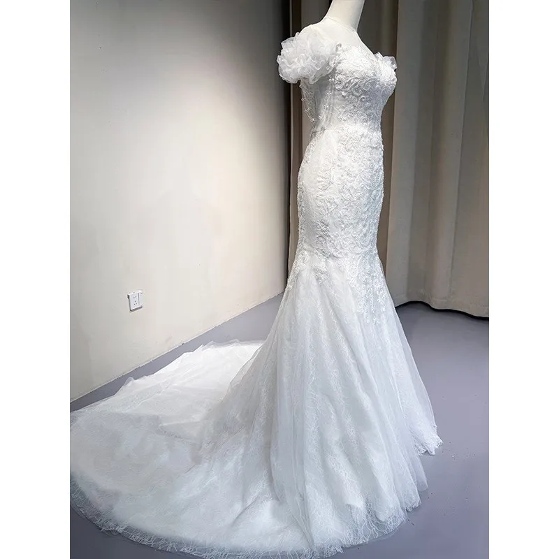 

A new luxurious and heavy-duty fishtail chiffon dress with one-shoulder knot main fabric trailing lace