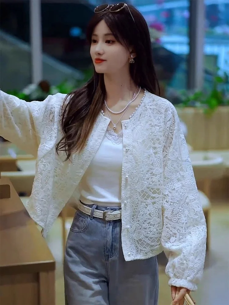 French Style high-end apricot heavy industry lace hook flower pearl round neck jacket for women in spring 2025 slim top