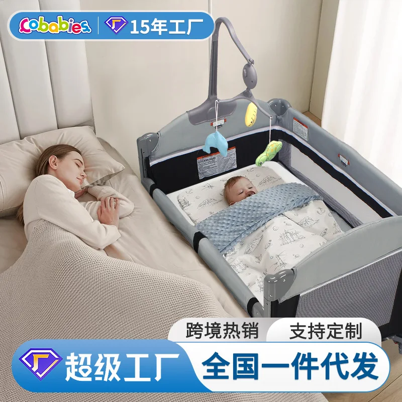 Multi-function crib splicing queen bed portable portable folding baby bed with diaper table mosquito net bedside bed