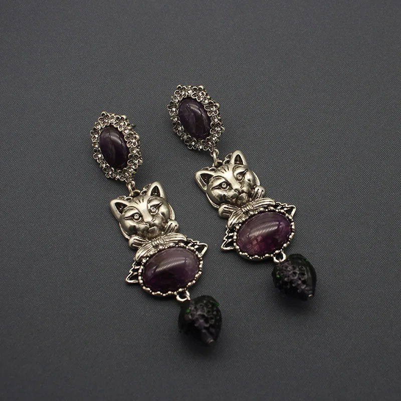 

Vintage Egyptian Cat Amethyst Stone Strawberry Glass Earrings