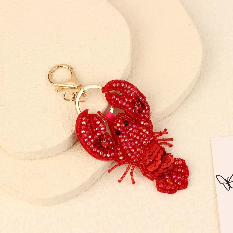 Neuer Strass-Hummer-Perlen-Anhänger, hübsche handgenähte Taschenanhänger, Krabbenmuscheln, Schildkröte, hängende Seilflicken, Applikation, Taschen-Lanyard